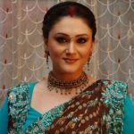 Radha Malhotra original name is Eva Grover